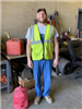 A Department of Public Works Worker posing for a photo at the Luncheon
