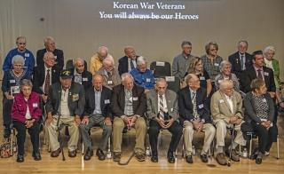 Korean veterans or family members representing those passed away